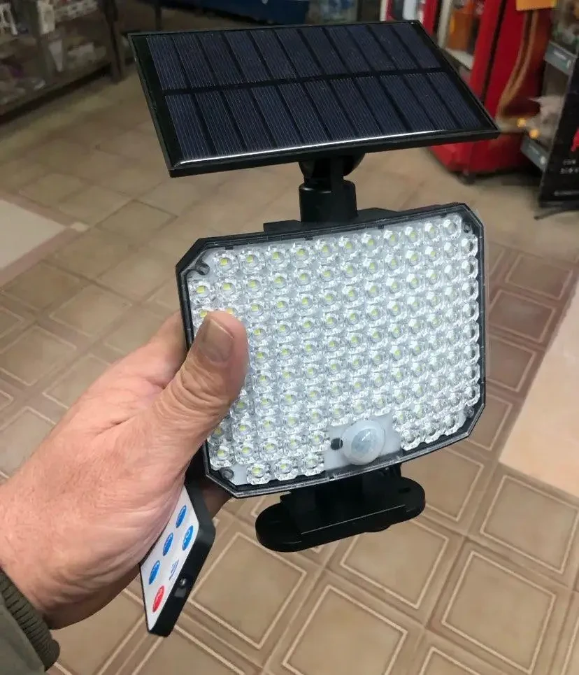 Светильник на солнечной батарее с датчиком движения Solar wall lamp BL-104-SMD