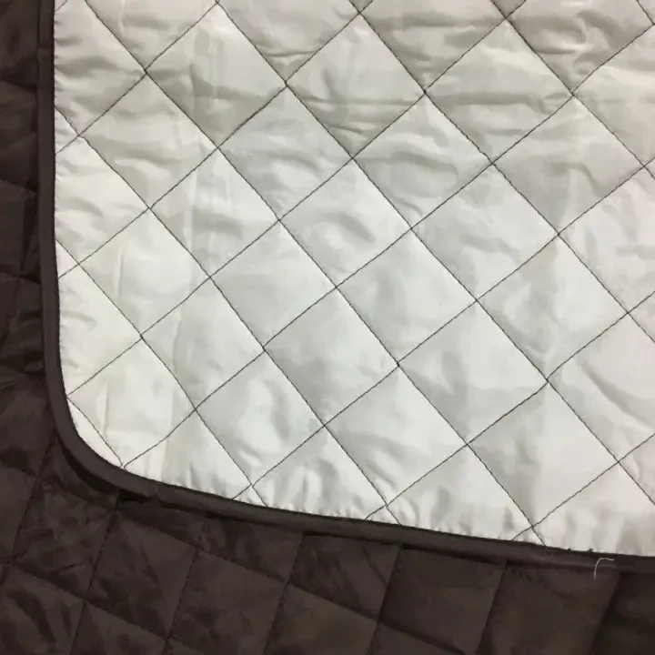 Двостороння накидка на диван Couch Coat коричневого кольору Чохол для меблів водонепроникний