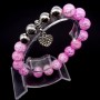 Жіночий браслет на резинці з натурального каменю "Рожевий кварц"
